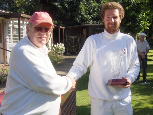 Rutger receives Cup from CA Chairman Jonathan Isaacs