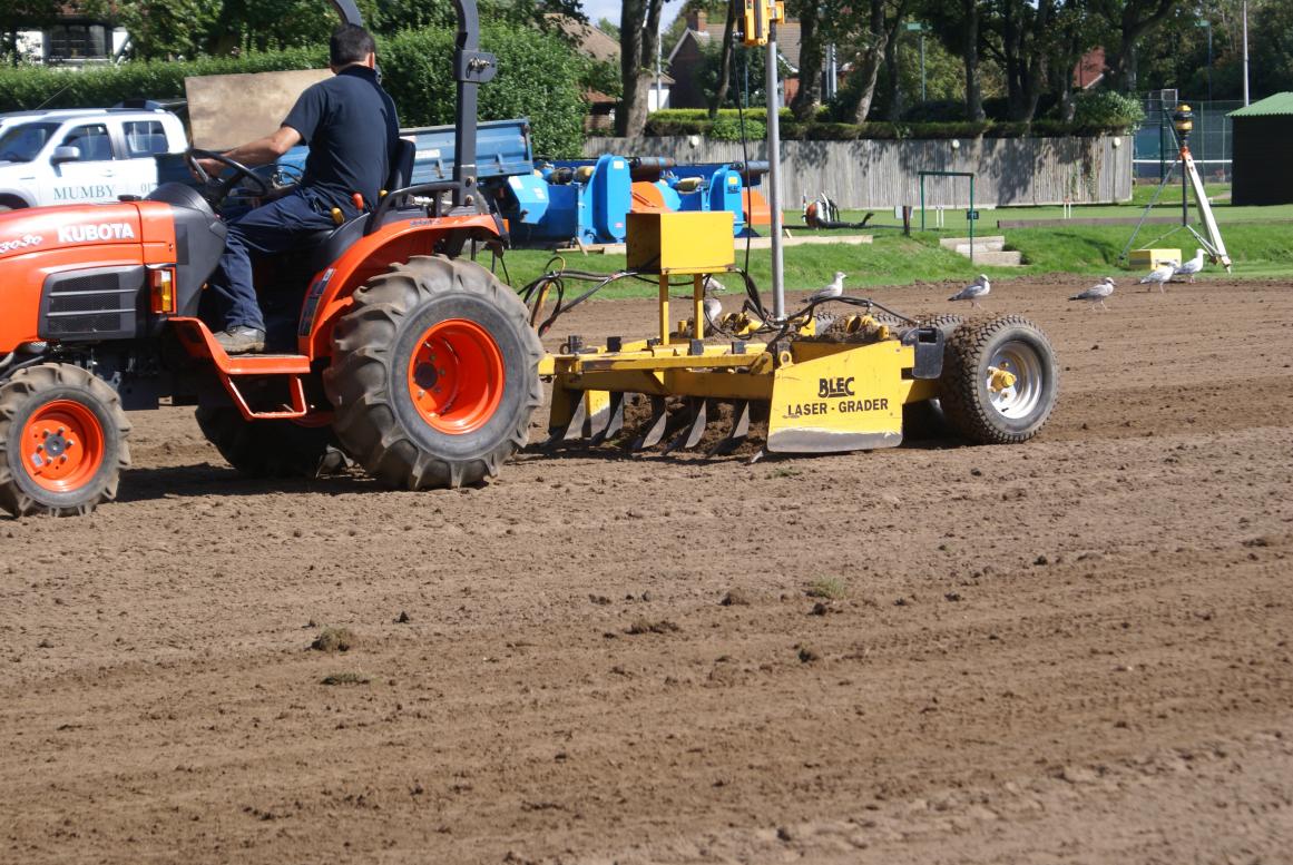 Laying new lawns (photo Ray Hall)