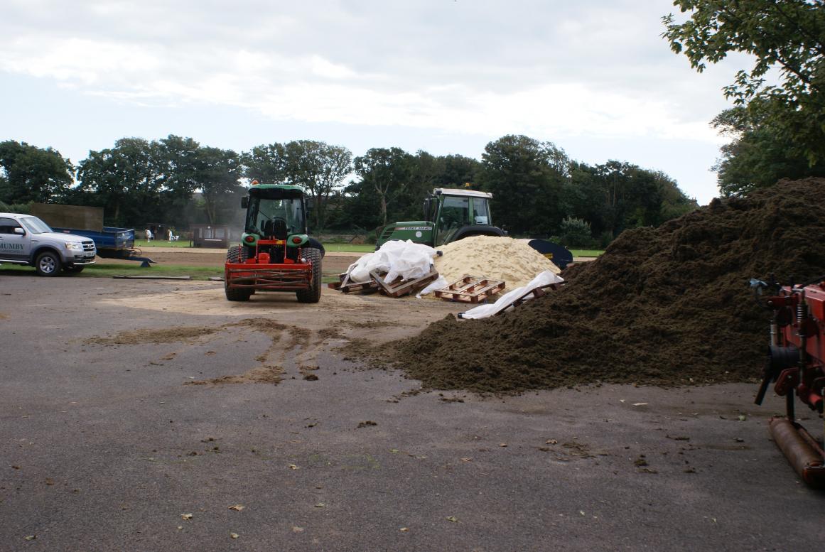 Laying new lawns (photo Ray Hall)