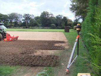 Laying new lawns (photo Ray Hall)