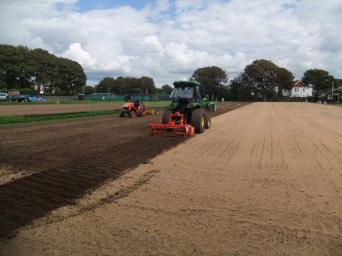 Laying new lawns (photo Ray Hall)