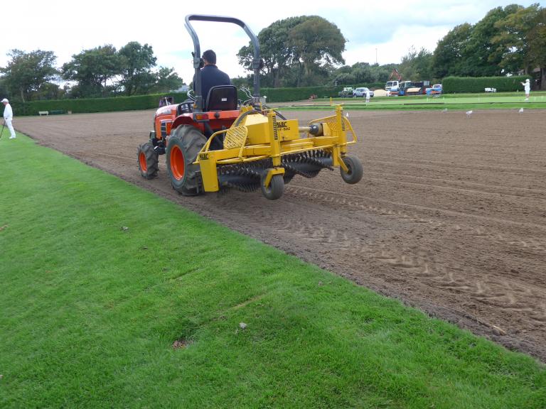 Laying new lawns (photo Ray Hall)