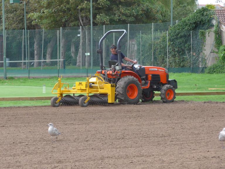Laying new lawns (photo Ray Hall)